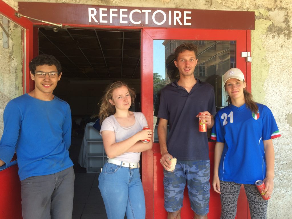High school pupils at work in the dining hall