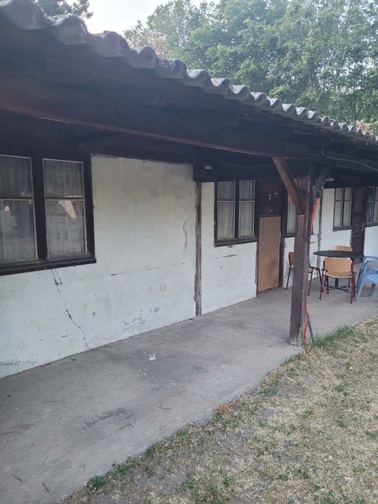 The sheds from outside, before the work